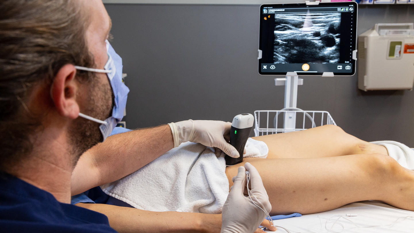 Dr. Oron Frenkel scans a patient