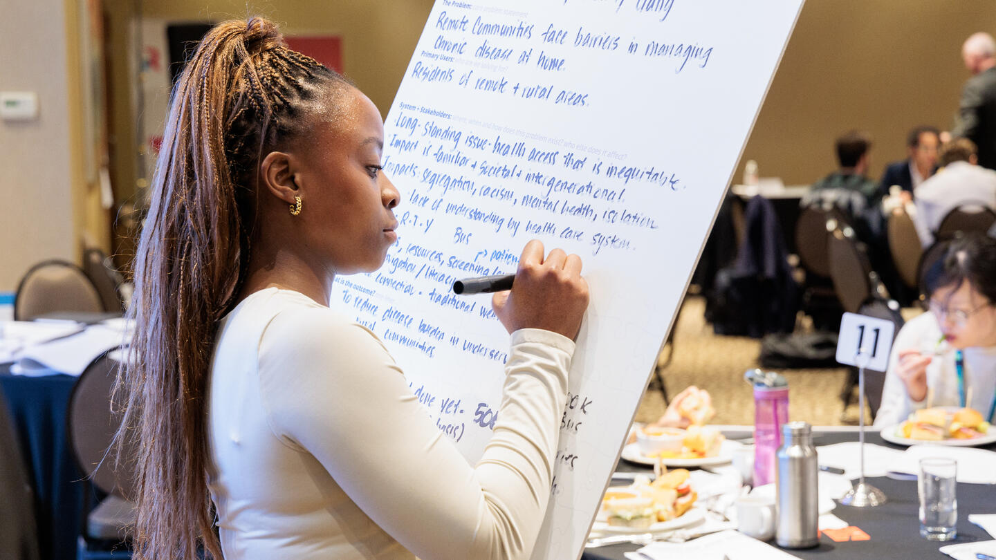 Participant Tinotenda Masvikeni works on a design-thinking activity.