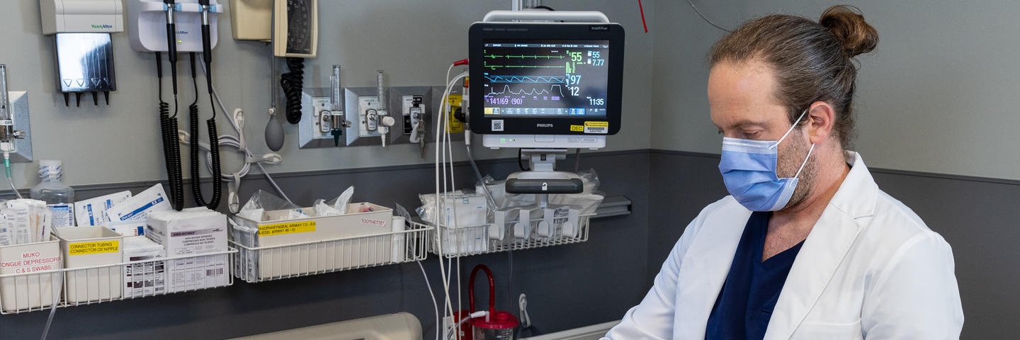 Dr. Oron Frenkel scans a patient