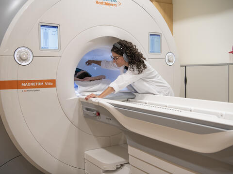 Dr. Rachel Eddy with a specialized xenon gas MRI